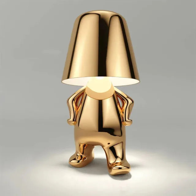 LuxeGlow™ gouden vloerlamp met artistiek mensfiguur – productafbeelding 1